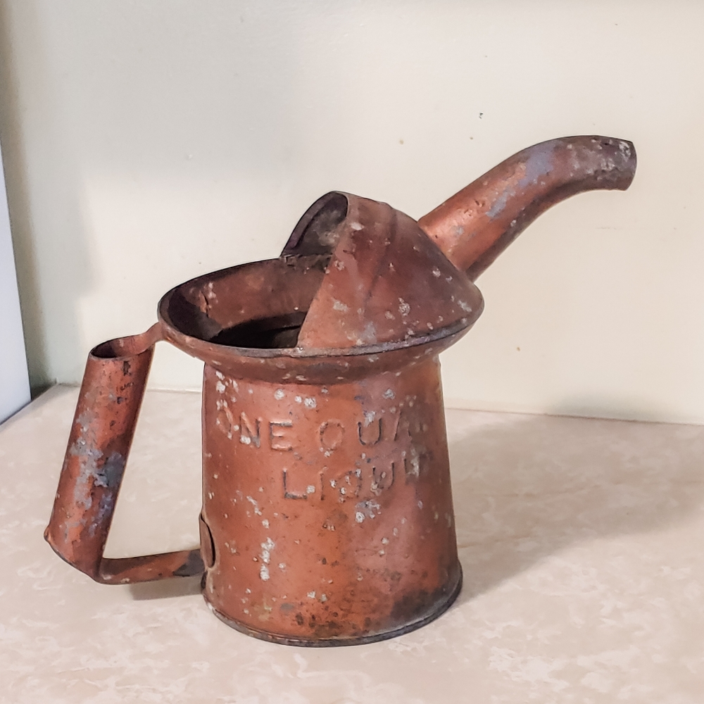 Antique oil can